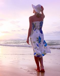 Woman walking on beach